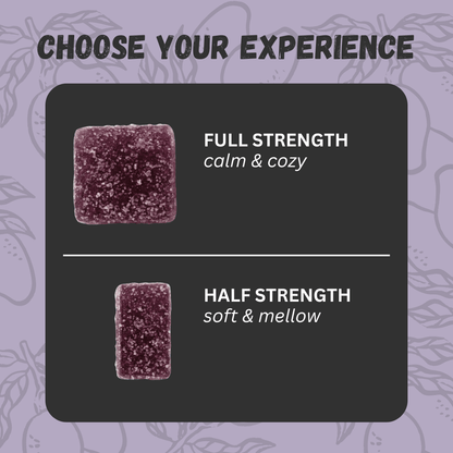 Two northern lights gummies on a black card with text indicating 'Full Strength' and 'Half Strength' on a purple background.